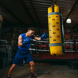 Боксерский мешок TITLE Boxing Greatest Black/Yellow 5